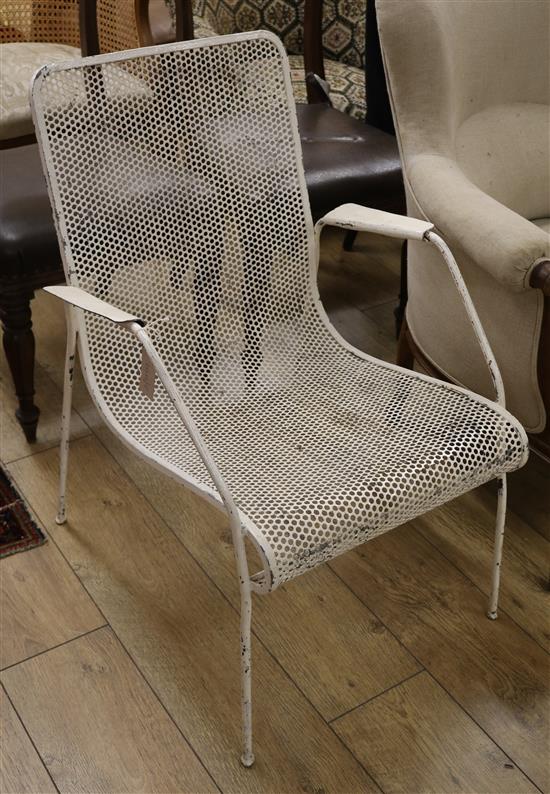 A 1950s metal garden chair